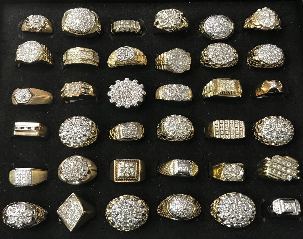 A collection of rings are displayed on display.